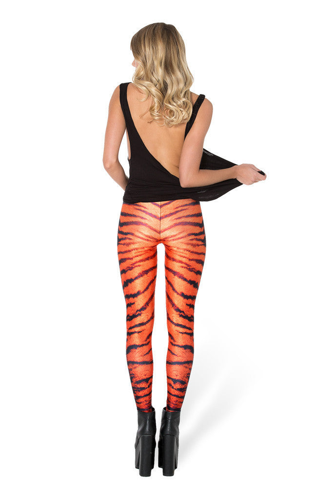 Orange with Black Trousers for Women with a Sporty Flair