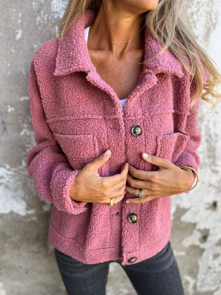 Fluffy coat with classic collar and patch pockets