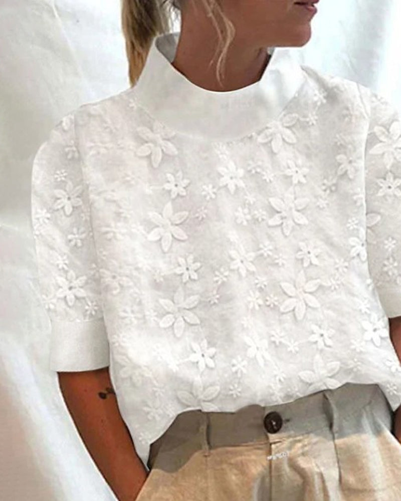 Blusa bordada com gola subida para senhora