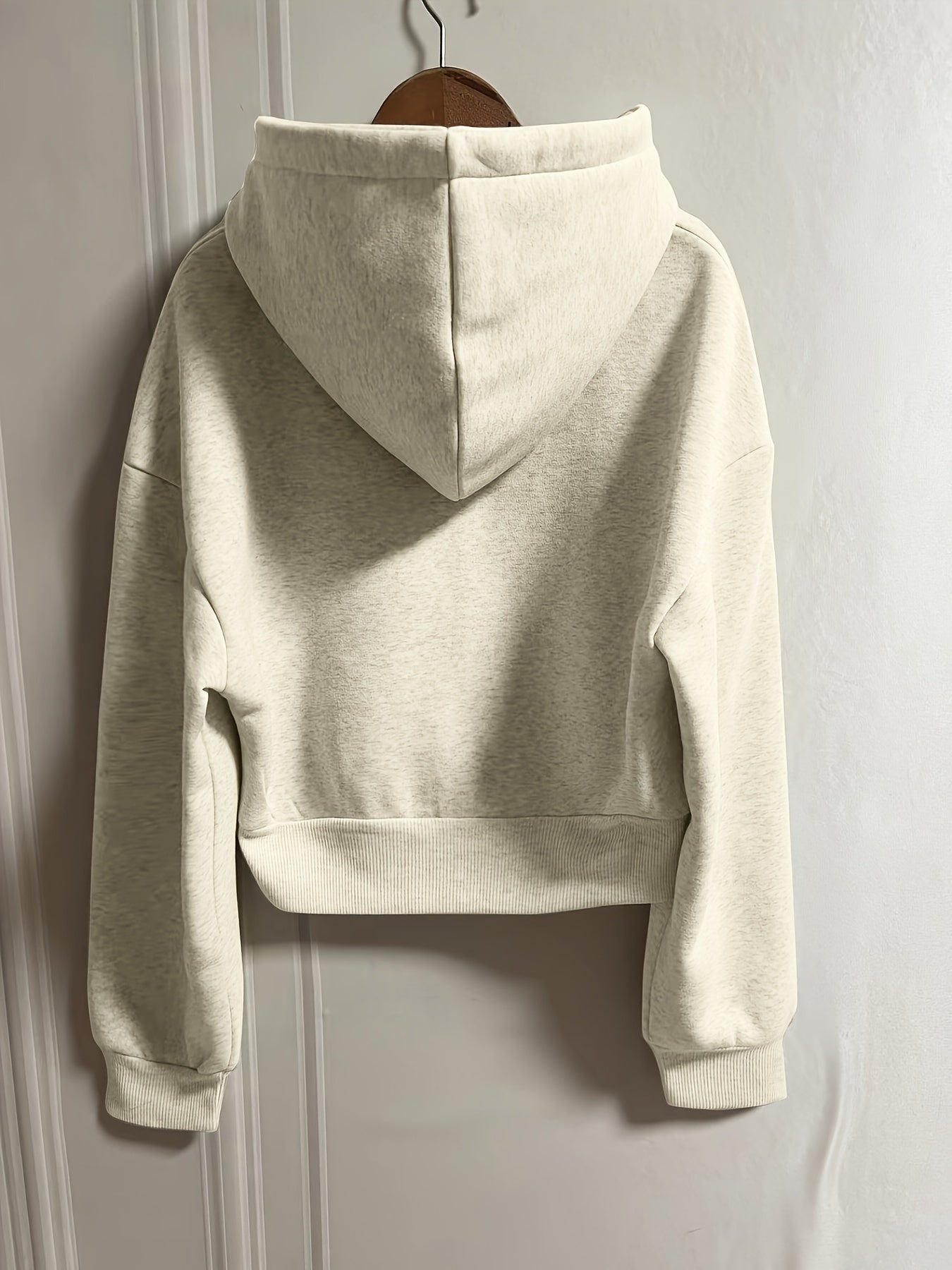 Sophie | Sweat à capuche uni avec zip et cordon de serrage