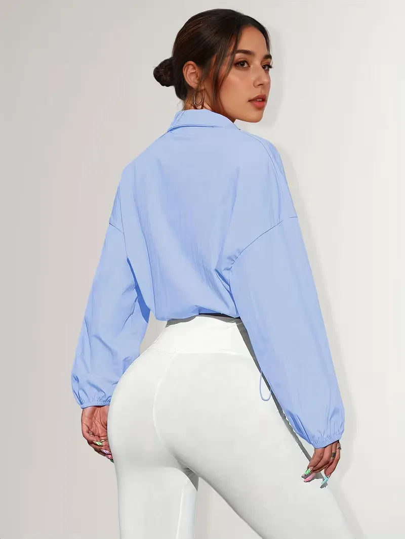 Veste de survêtement avec poignets élastiques