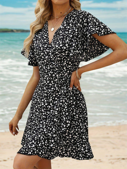 Leichtes Sommerkleid für Damen mit Blumenmuster und elegantem Wickeldesign