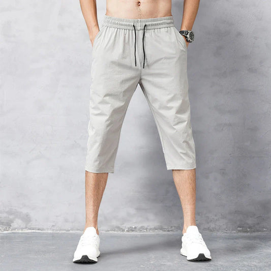 Pantalones cortos deportivos casuales de ocho puntos para hombre