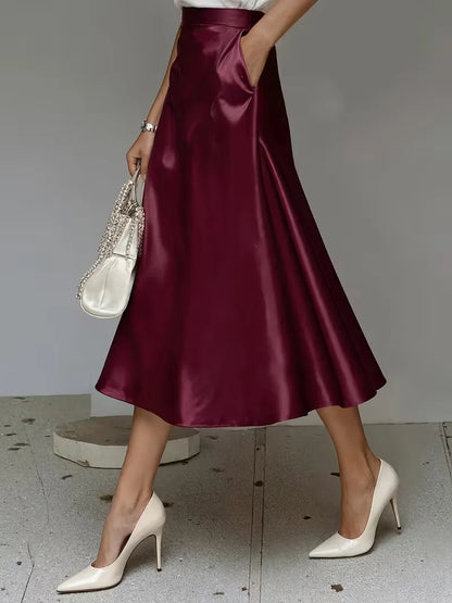 Jupe midi en satin à taille haute