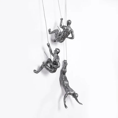 Conjunto de esculturas decorativas de pared con figuras trepadoras para una decoración moderna