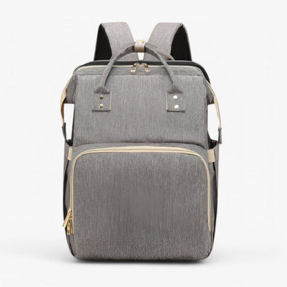 2-in-1 diaper bag with retractable crib