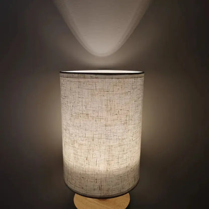 Minimalist Table Lamp with Wooden Base and Fabric Shade for Ambient Light