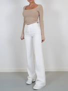 Pantalon élégant taille haute avec couture verticale à l’avant