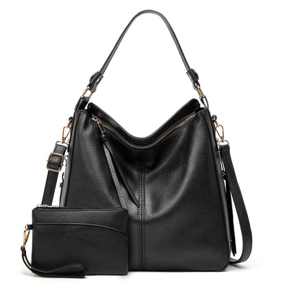 Classic leather shoulder bag with sleek gold details