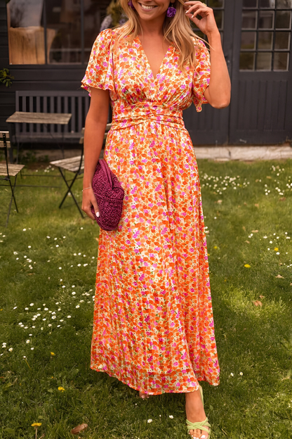 Abito lungo con scollo a V e stampa floreale, per un elegante look estivo