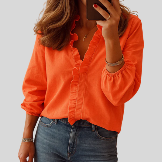 Blusa elegante con volantes