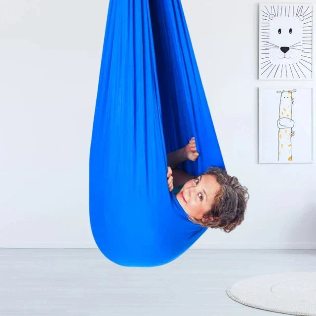 Columpio colgante terapéutico para niños: cápsula sensorial de interior
