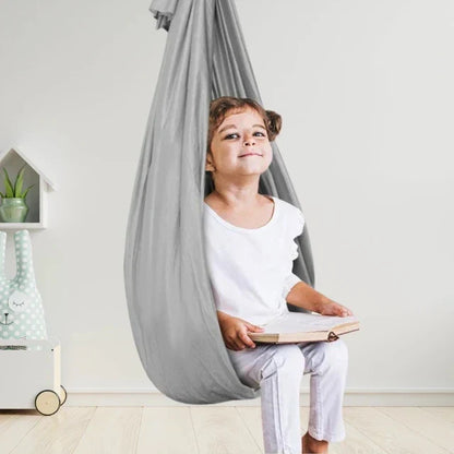 Columpio colgante terapéutico para niños: cápsula sensorial de interior