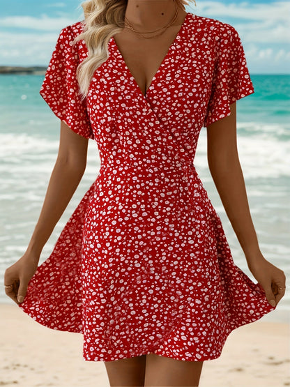 Leichtes Sommerkleid für Damen mit Blumenmuster und elegantem Wickeldesign