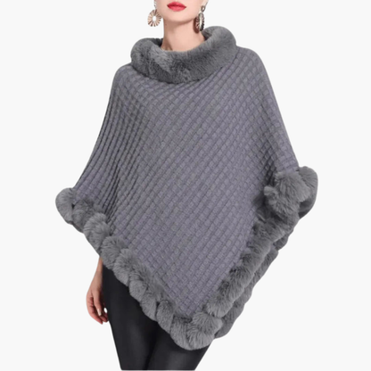 Poncho da donna in maglia con bordo in pelliccia sintetica e vestibilità oversize