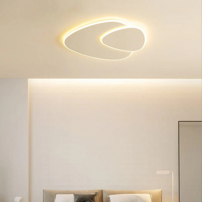 Plafoniera minimalista a LED con forma ellittica organica, per interni moderni