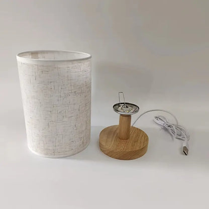Minimalist Table Lamp with Wooden Base and Fabric Shade for Ambient Light
