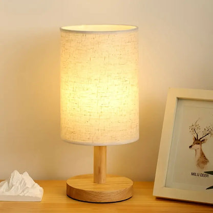 Minimalist Table Lamp with Wooden Base and Fabric Shade for Ambient Light
