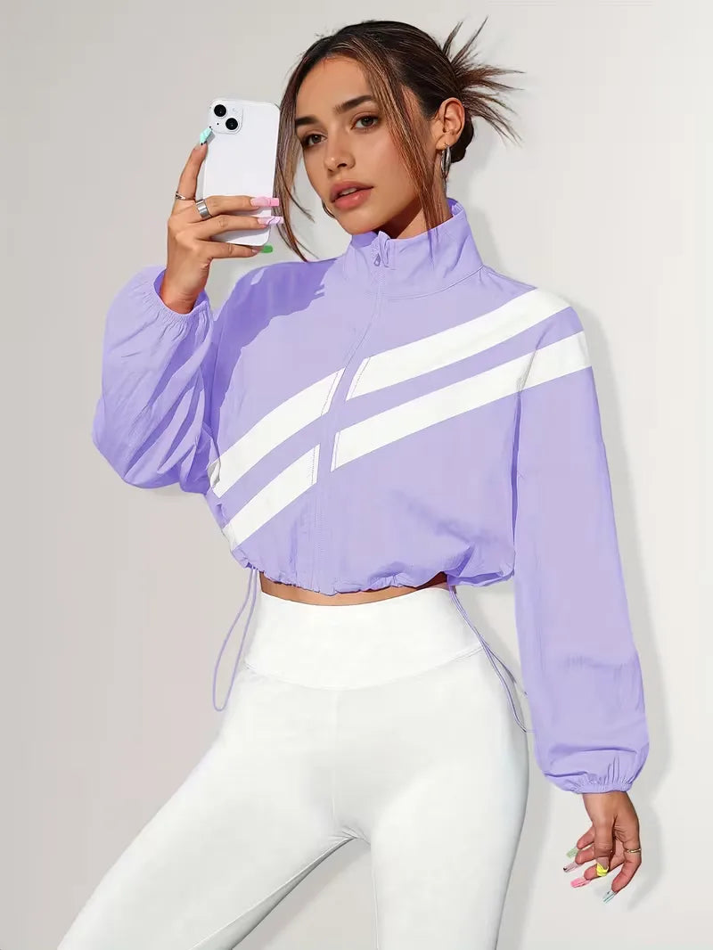 Veste de survêtement avec poignets élastiques