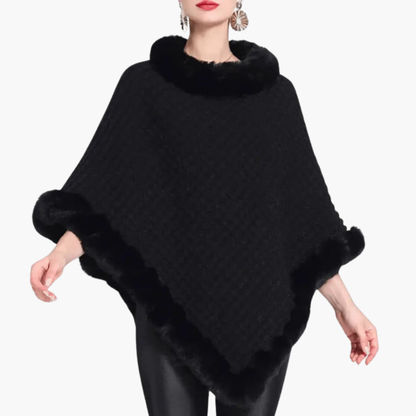 Poncho da donna in maglia con bordo in pelliccia sintetica e vestibilità oversize