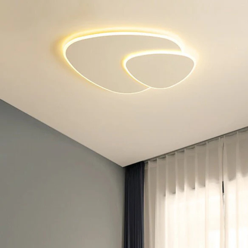 Plafoniera minimalista a LED con forma ellittica organica, per interni moderni