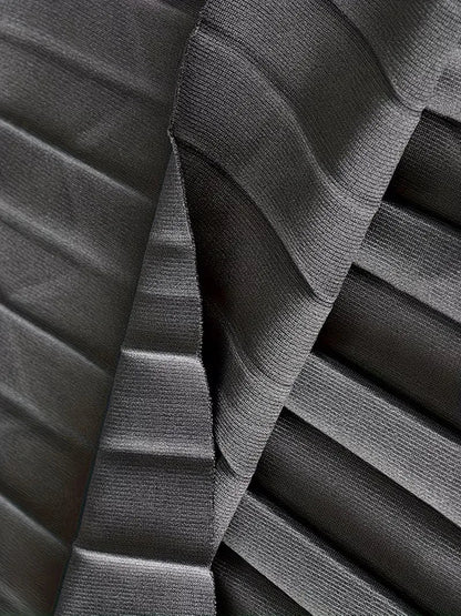 Jupe plissée taille haute