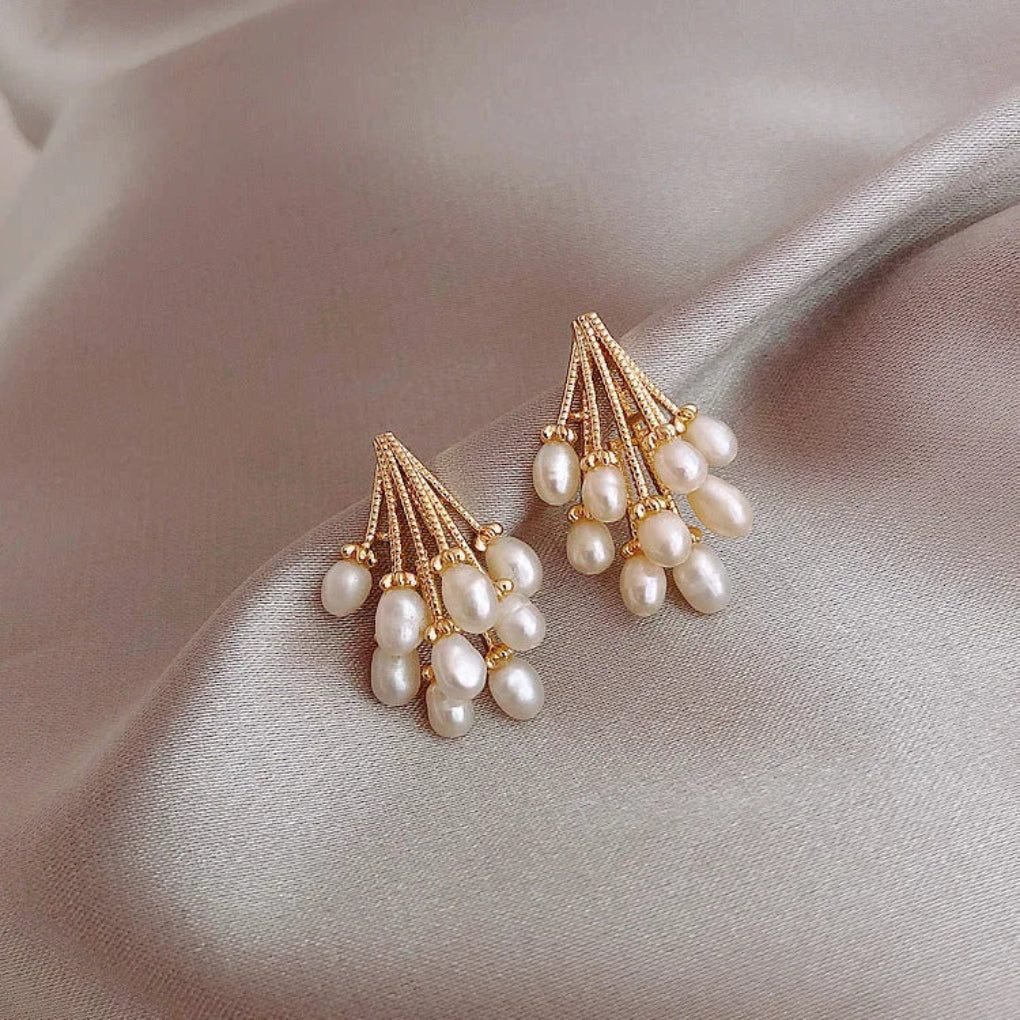 Earrings gilded with 18-carat gold.