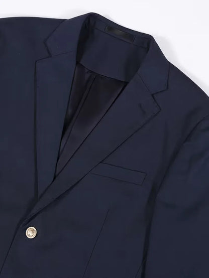 Blazer slim avec boutons dorés