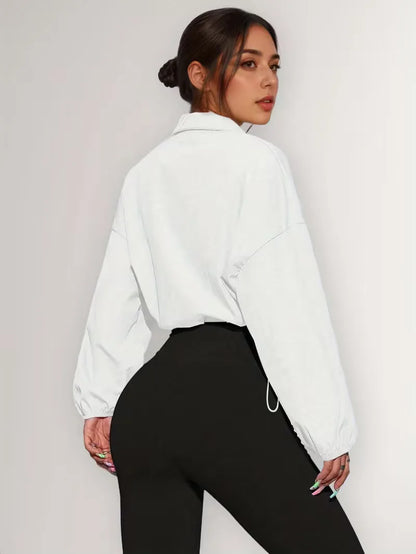 Veste de survêtement avec poignets élastiques