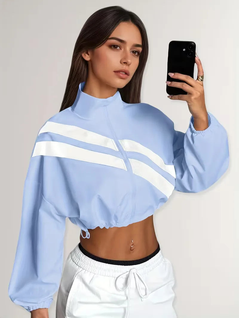 Veste de survêtement avec poignets élastiques