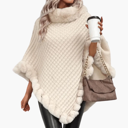 Poncho da donna in maglia con bordo in pelliccia sintetica e vestibilità oversize