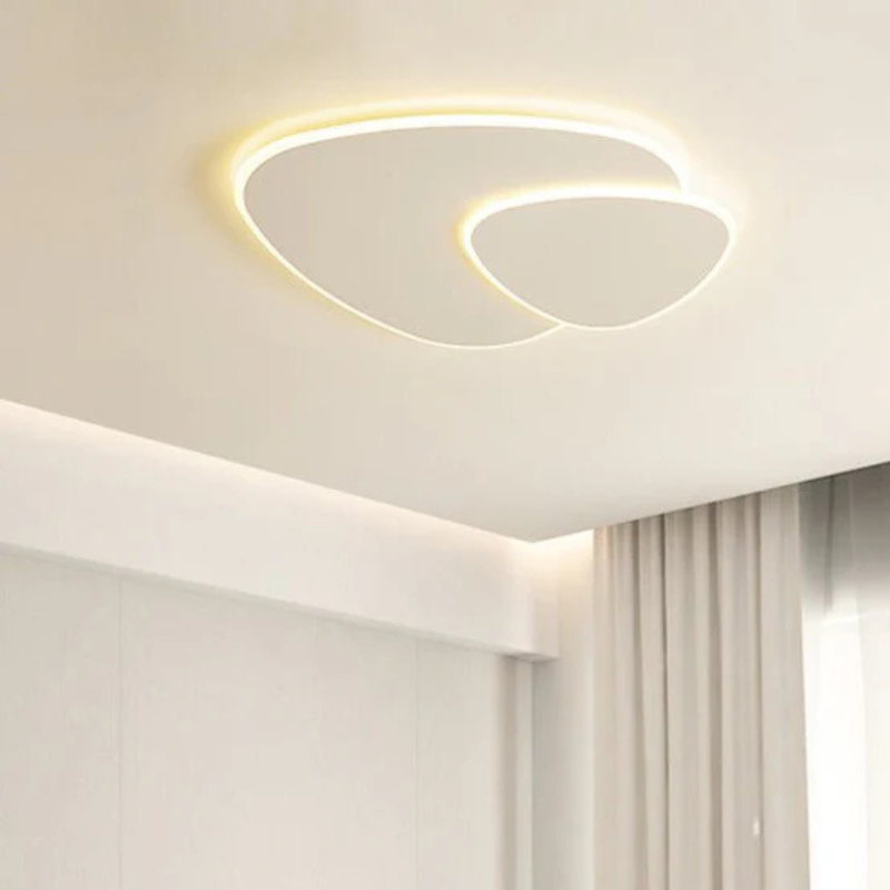 Plafoniera minimalista a LED con forma ellittica organica, per interni moderni