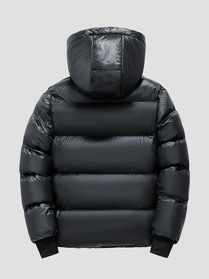 Warme winterjas van polyester met losse pasvorm en capuchon – Tommie