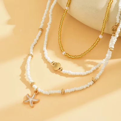 Collier Coquillage et Étoile