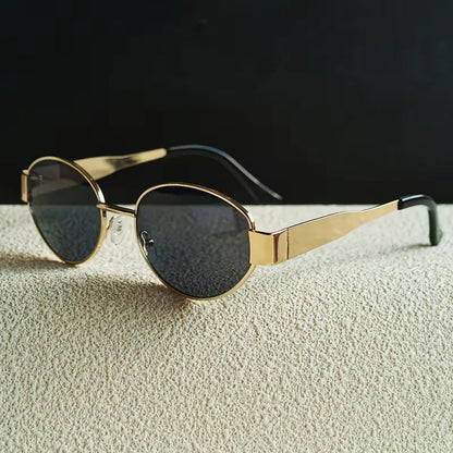 Lunettes de soleil avec monture métallique ovale