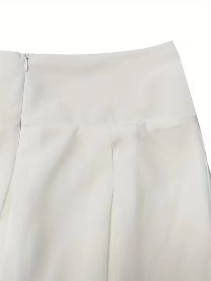 Jupe plissée taille haute