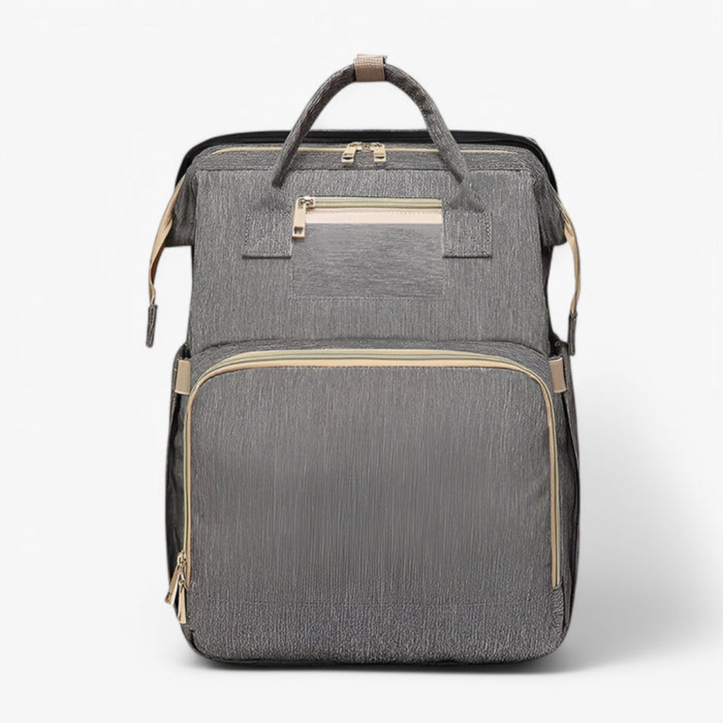 2-in-1 diaper bag with retractable crib