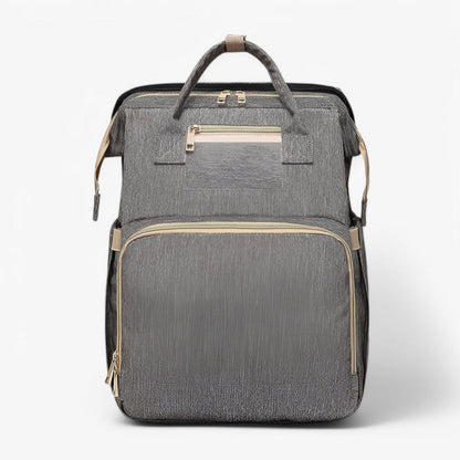2-in-1 diaper bag with retractable crib