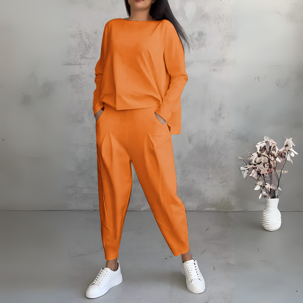 Conjunto deportivo de dos piezas con cuello redondo y mangas largas
