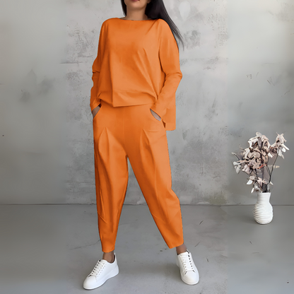 Conjunto deportivo de dos piezas con cuello redondo y mangas largas