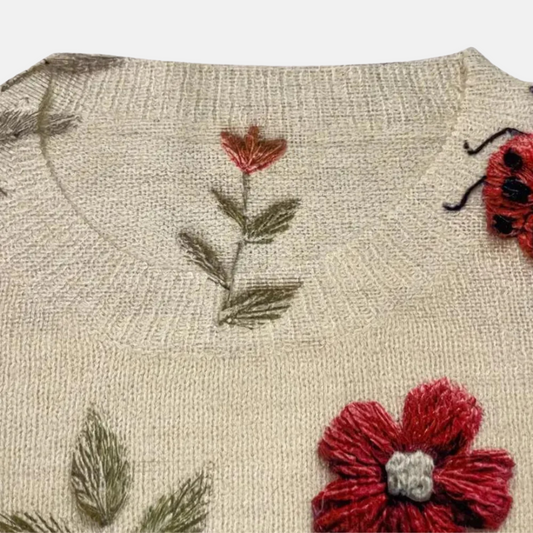 Suéter de punto con flores en 3D