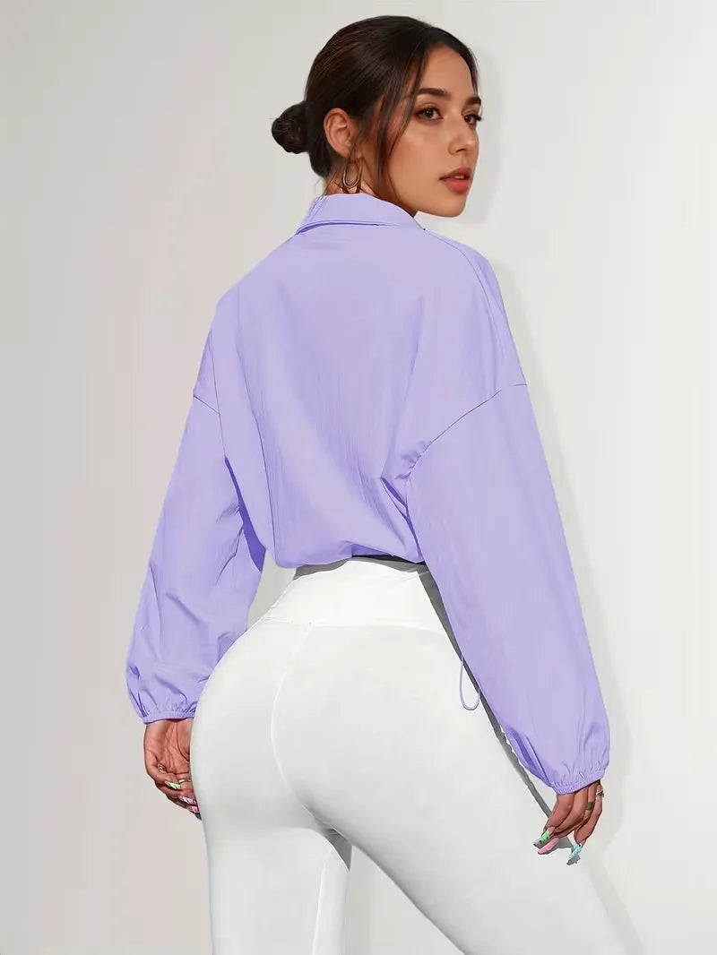 Veste de survêtement avec poignets élastiques