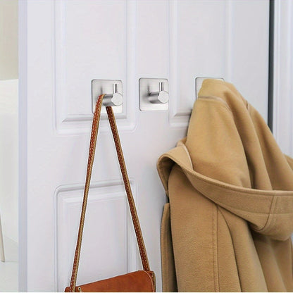 Set di 4 ganci da parete autoadesivi in acciaio inossidabile – Minimalisti, resistenti e impermeabili