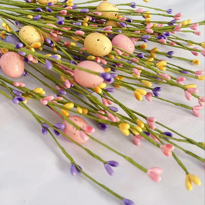 Ramas decorativas de Pascua con huevos de colores para una alegre decoración primaveral