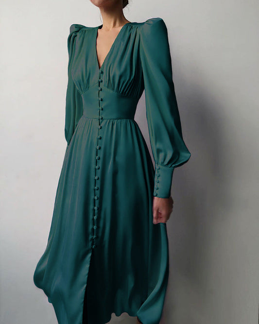 Vestido de satén francés con mangas abullonadas y cintura ajustada
