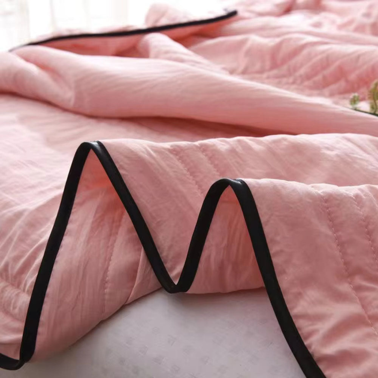 The Everchill Ice Cooling Blanket keeps you comfortable and cool all night long