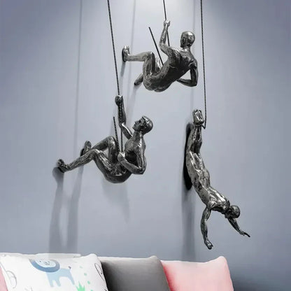 Conjunto de esculturas decorativas de pared con figuras trepadoras para una decoración moderna
