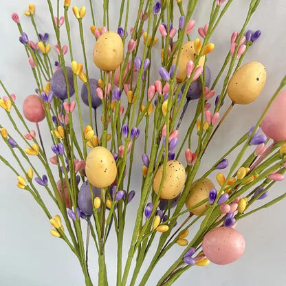 Ramas decorativas de Pascua con huevos de colores para una alegre decoración primaveral