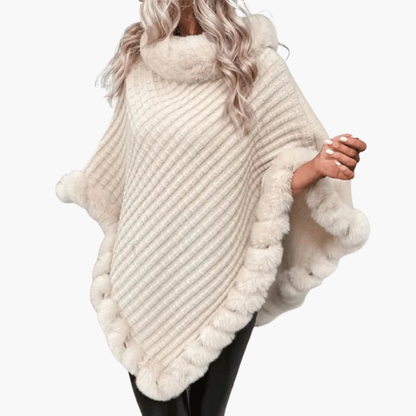 Poncho da donna in maglia con bordo in pelliccia sintetica e vestibilità oversize