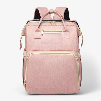 2-in-1 diaper bag with retractable crib
